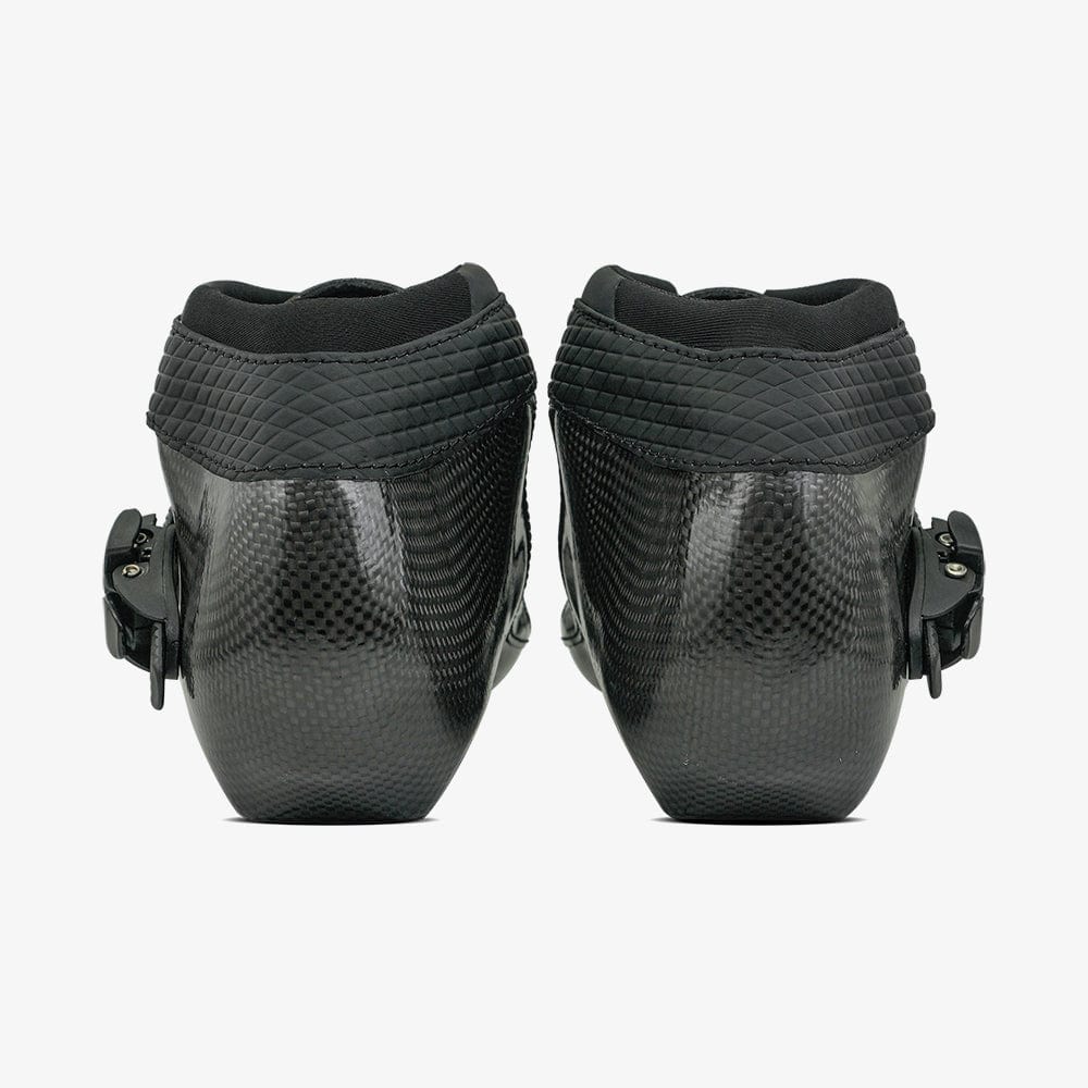black-Detail shot of the narrow cuff construction and ankle contour