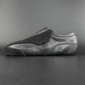 Side view of the Envy suede skate showing black suede finish