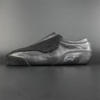 Side view of the Envy suede skate showing black suede finish
