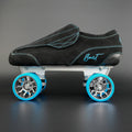 Side view of skate with Envy Carbon boot, Moonwalk wheels, and Tracer plate
