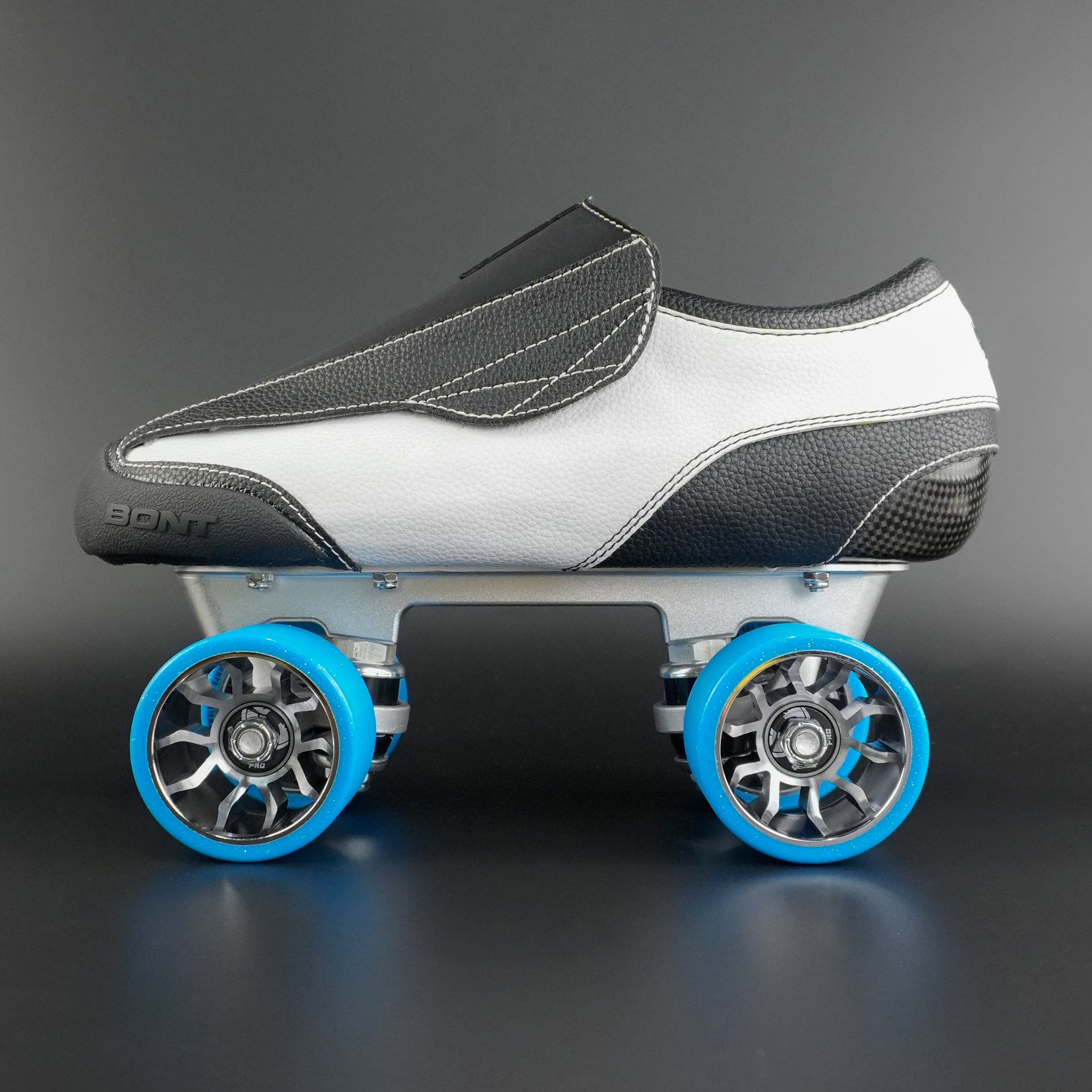 Side view of the Bont Envy roller skate boot in black with white accents