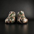 Skater wearing Envy Camo Roller Skates in motion