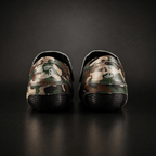 Skater wearing Envy Camo Roller Skates in motion
