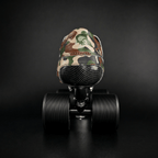 Skater wearing Envy Camo Roller Skates in motion