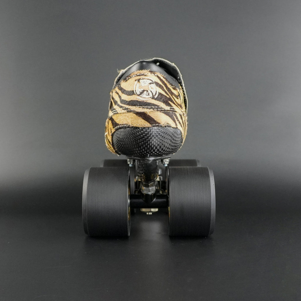 Skater wearing Envy Cow Zebra Print Style Roller Skates in motion