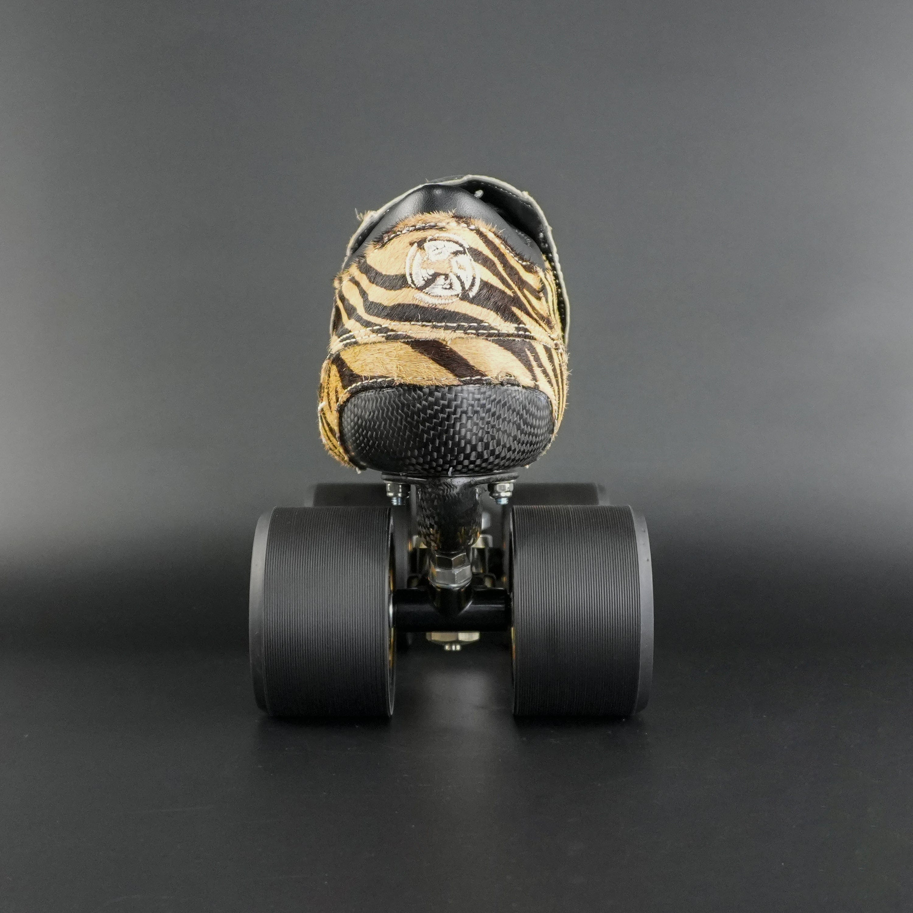 Skater wearing Envy Cow Zebra Print Style Roller Skates in motion