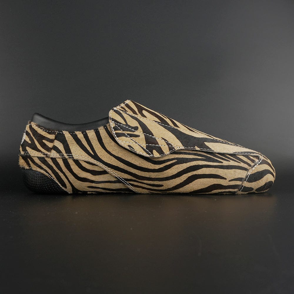 Close-up of Genuine Leather with Fur & Zebra Print Style and carbon base