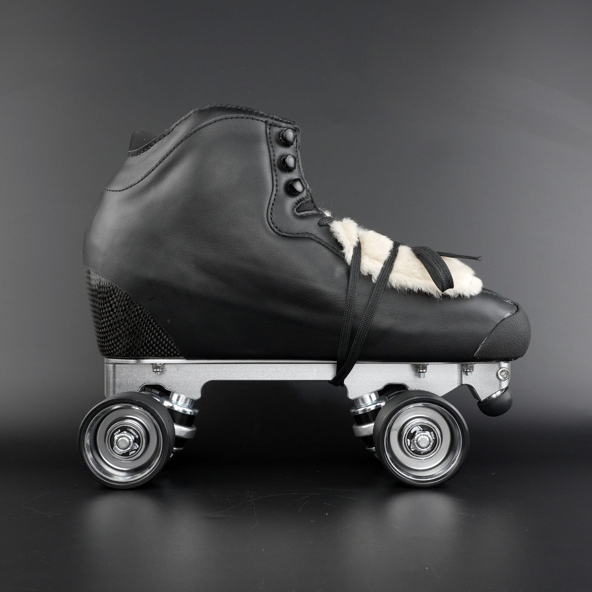 Rhythm skate setup showing lightweight boot and quad wheels